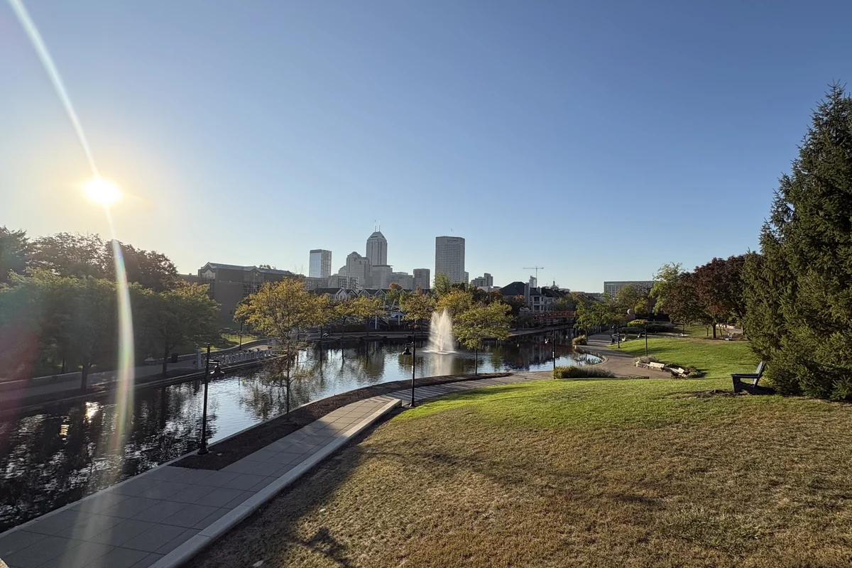 The Indianapolis skyline beyond the Canal Walk and its fountain.