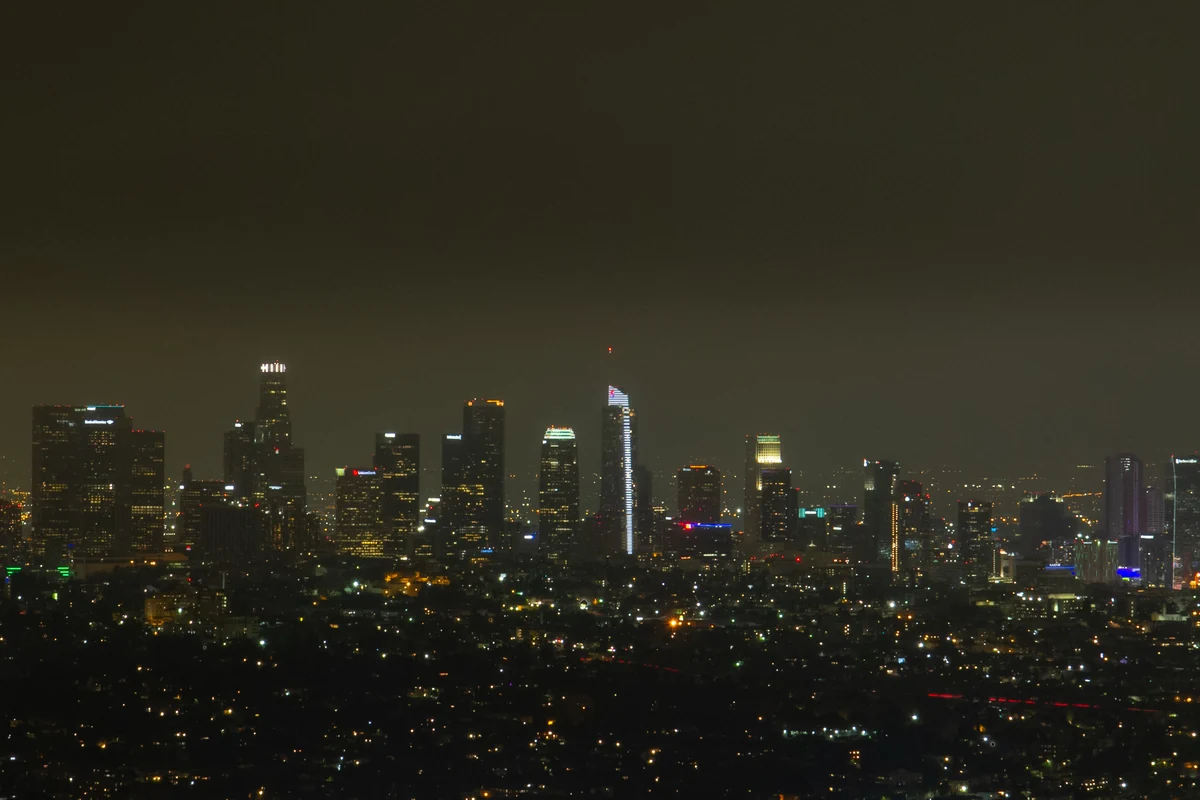The Los Angeles skyline and city lights seen at night from Griffith Observatory.