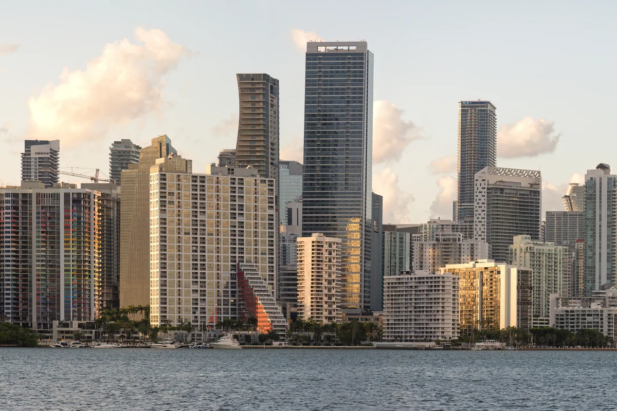 Miami high-rise buildings in warm evening light.