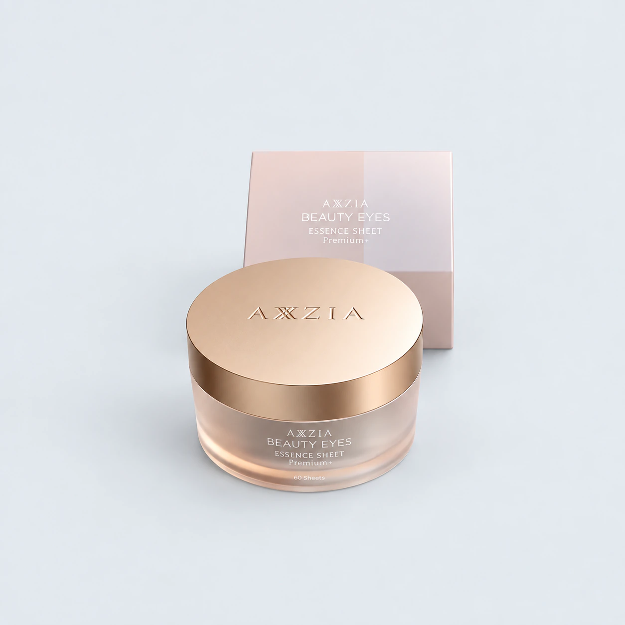 AXXZIA Beauty Eyes Essence Sheet Premium Plus with its original box on a gray background