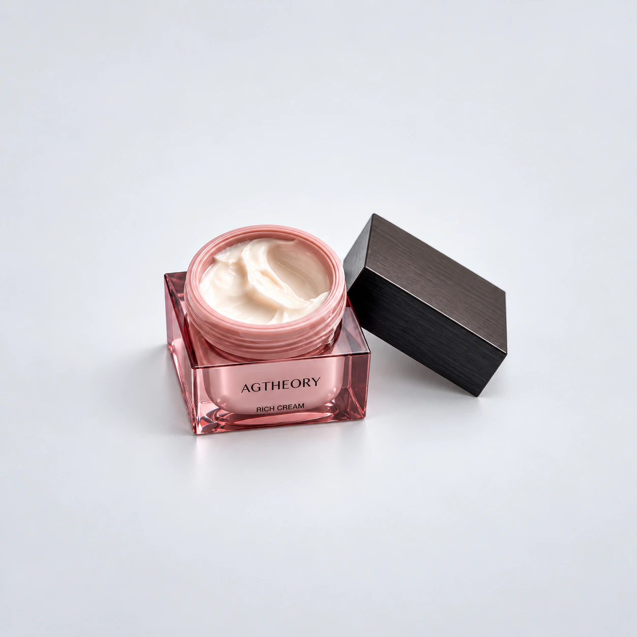 AGTHEORY Rich Cream 30g — open jar and original lid on a gray background